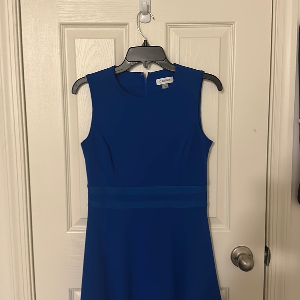 Blue sleeveless dress perf for graduation and family events. Worn 1 time